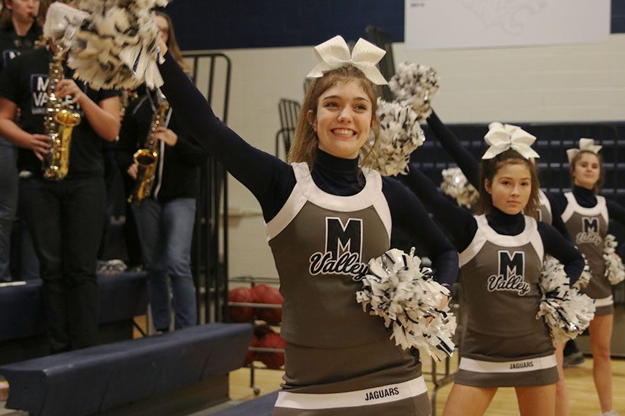 After the win on Tuesday, Jan. 15, sophomore Madison Jensen cheers from the sideline.