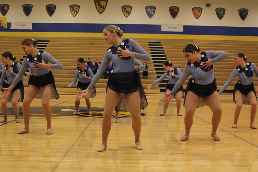 During the jazz routine, which was awarded the Outstanding Choreography Award at Miss Kansas, senior Bella Line places her hand over her chest. 