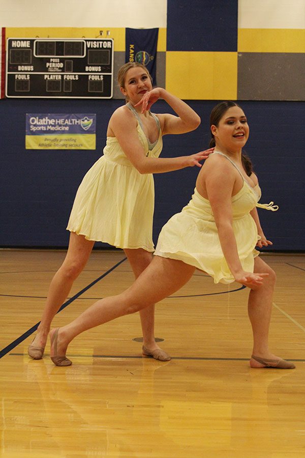 During their ensemble routine, juniors Sydney Ebner and Samantha Pennington begin to lunge.