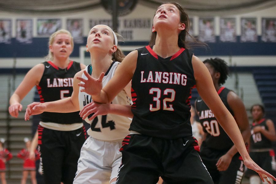 After a shot, freshman Emree Zars looks up towards the basket and prepares to get the rebound. 