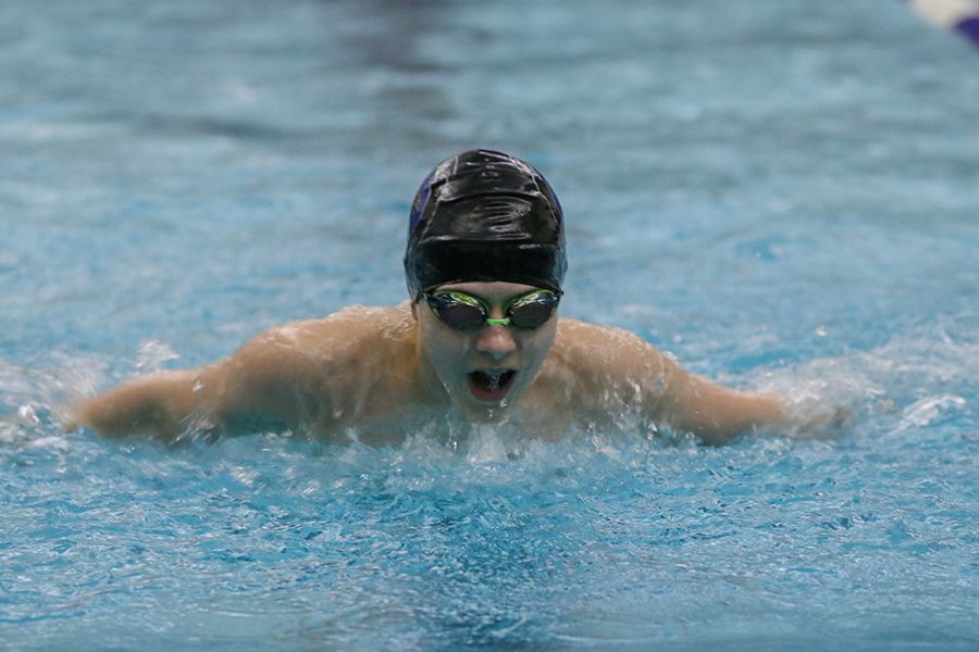 Looking down toward the water, freshman Ryan Biven takes a breath of air. 