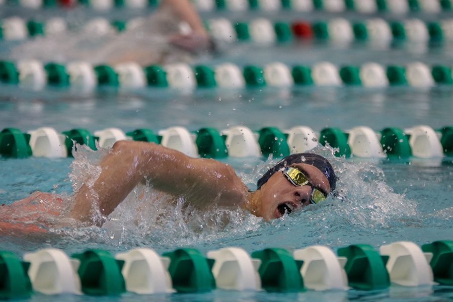 In the middle of the freestyle stroke, sophomore Cole McClure takes a breath of air and continues on with the 500 Yard Freestyle. McClure finished 2nd in his heat at the EKL Swim and Dive Championships on Saturday, Feb. 2.   