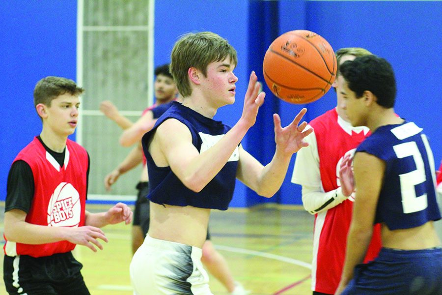 During a game against the Spicy Boys, junior Jake Keller looks to receive a pass from his teammate on Tuesday, Jan. 29. “I like playing with and against my friends and everyone’s having fun while it’s still competitive,” Keller said.