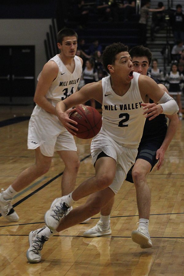 Dashing past a defender, senior Matty Wittenauer tries to make a play.