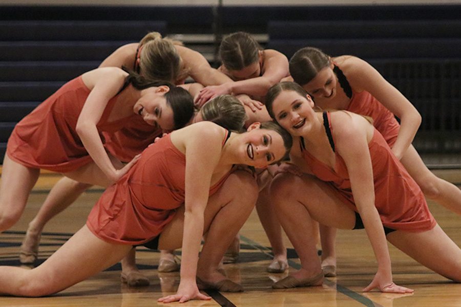 At the finale of the sophomore ensemble on Saturday, March 30, sophomores Lauren Acree, Jenna Haase, Lauren Jarvis, Tyler Bret, Kenzie Harris, Kate Sutton and Emily Gipson gather around each other. 