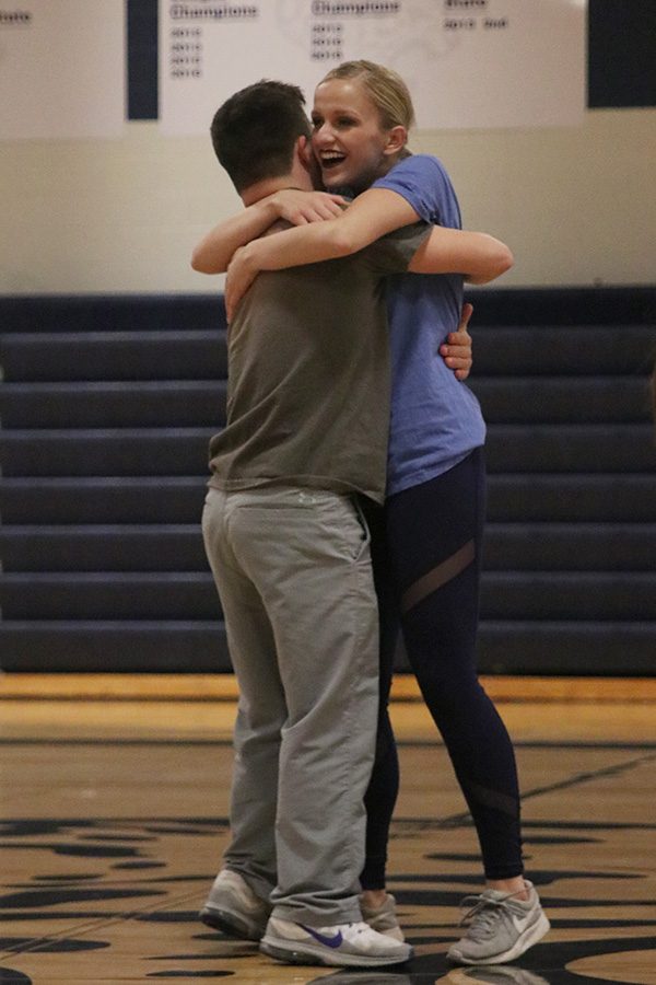 After the Super Stars dance on Saturday, March 30, seniors Bella Line and Matt Santaularia hug.