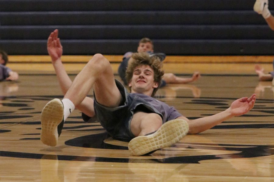 During the Silver Studs performance on Saturday, March 30, junior Gavin Fangman falls into a death drop.