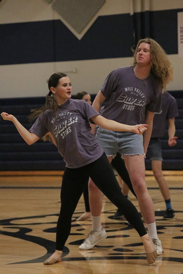 Dancing alongside Silver Stud senior Killian O’Brien, senior Olivia Augustine performs at the spring show on Saturday, March 30.