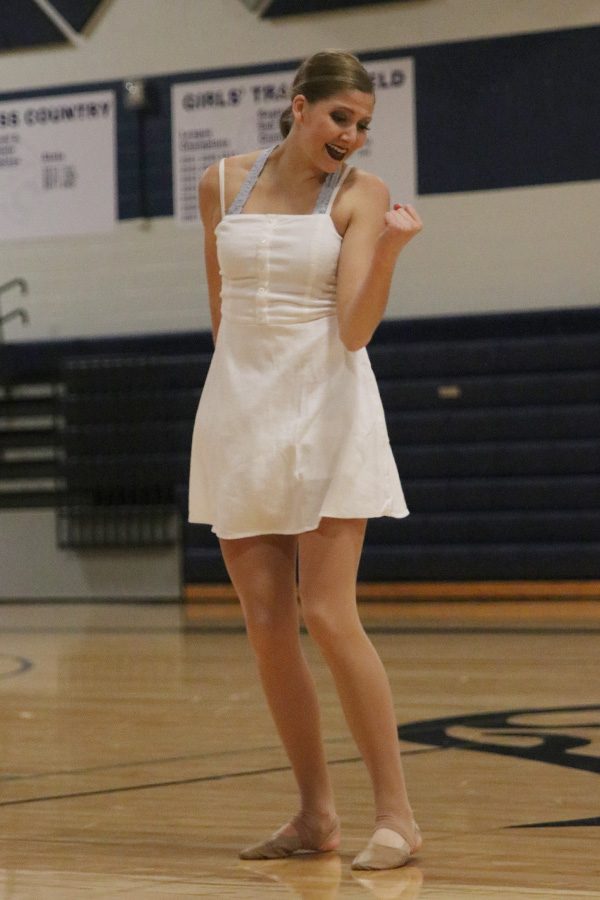 Performing her solo for the last time, senior Addie Ward dances in the spring show on Saturday, March 30.