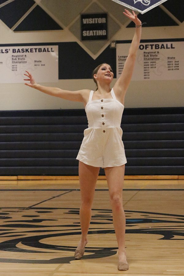 Senior Addie Ward dances in the senior ensemble at the spring show on Saturday, March 30. 