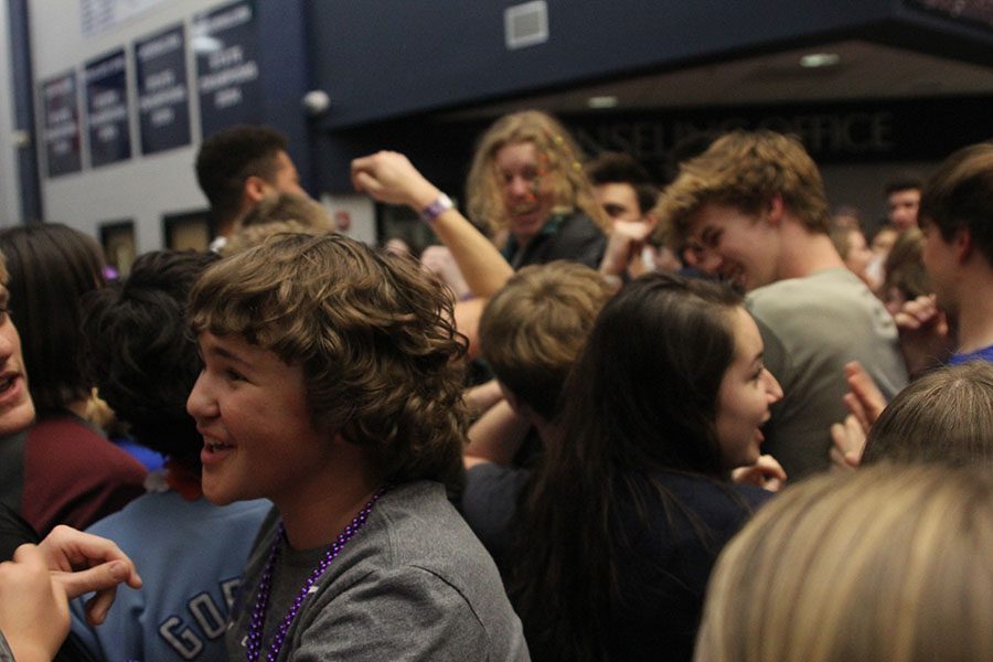 Students dance at the Dance Party in the main hallway.