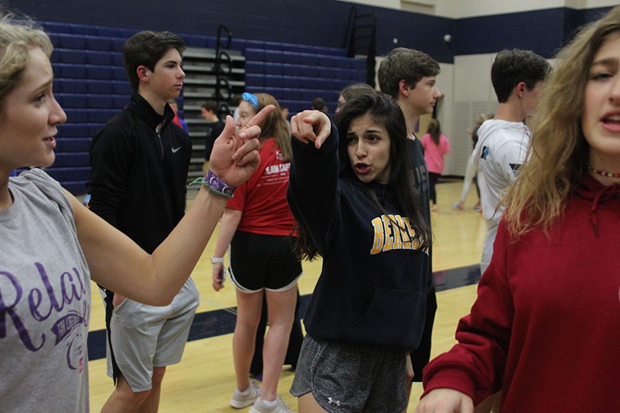 Freshman Deema Rashid dances with her friends.