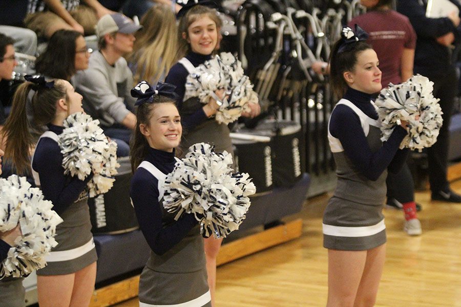 At the girls basketball substate game on Thursday, Feb. 28, sophomores Maddy McDonald and Morgan Botts cheer as the team scores. [Cheer] gets people pumped up and ... excited for [sporting games], Botts said.