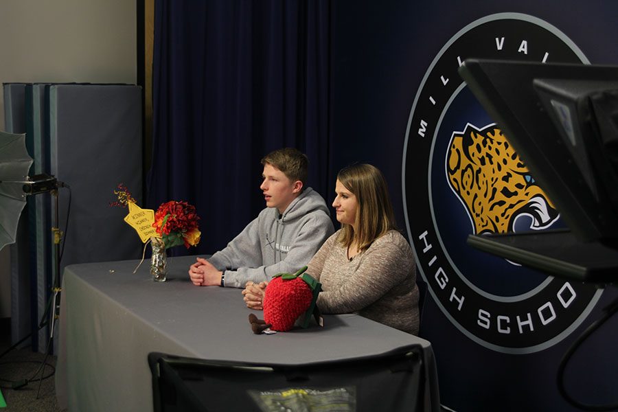 While filming announcements on Wednesday, March 6, sophomore Tanner Jones and junior Ashley Grega read their script off the teleprompter.