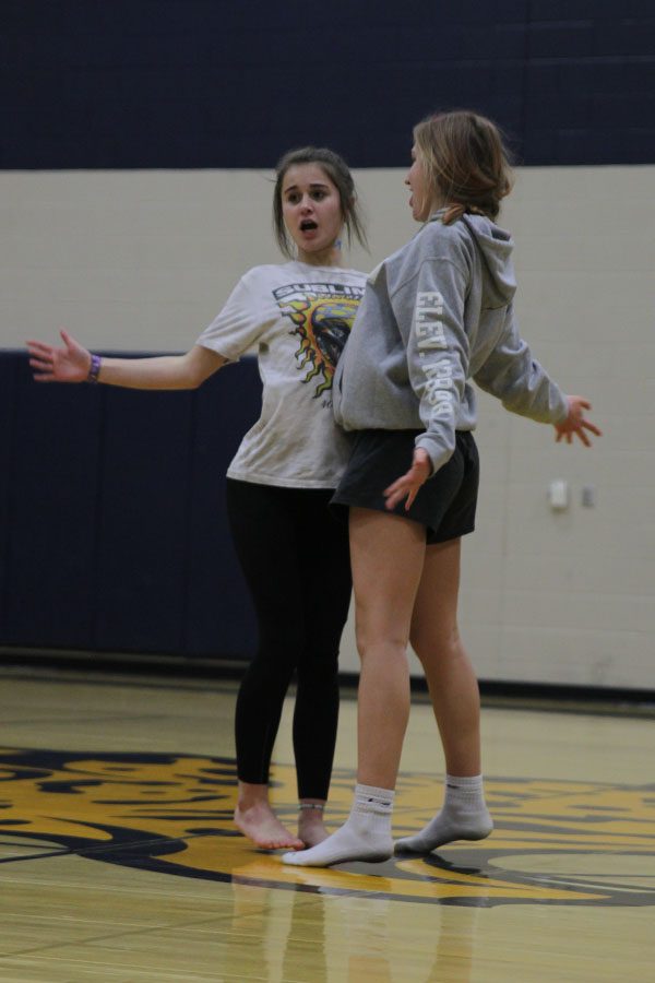 Squaring up, sophomore Caiden Dean and junior Mallory Scheelk sing to Justin Bieber.