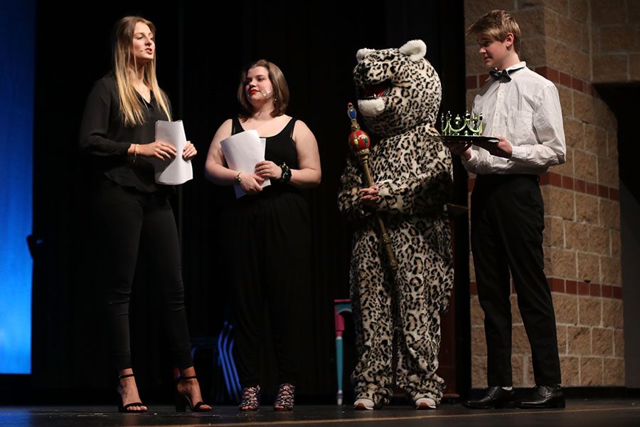 Hosts junior Annie Bogart and senior Lindsey Edwards build anticipation before the final rose ceremony.