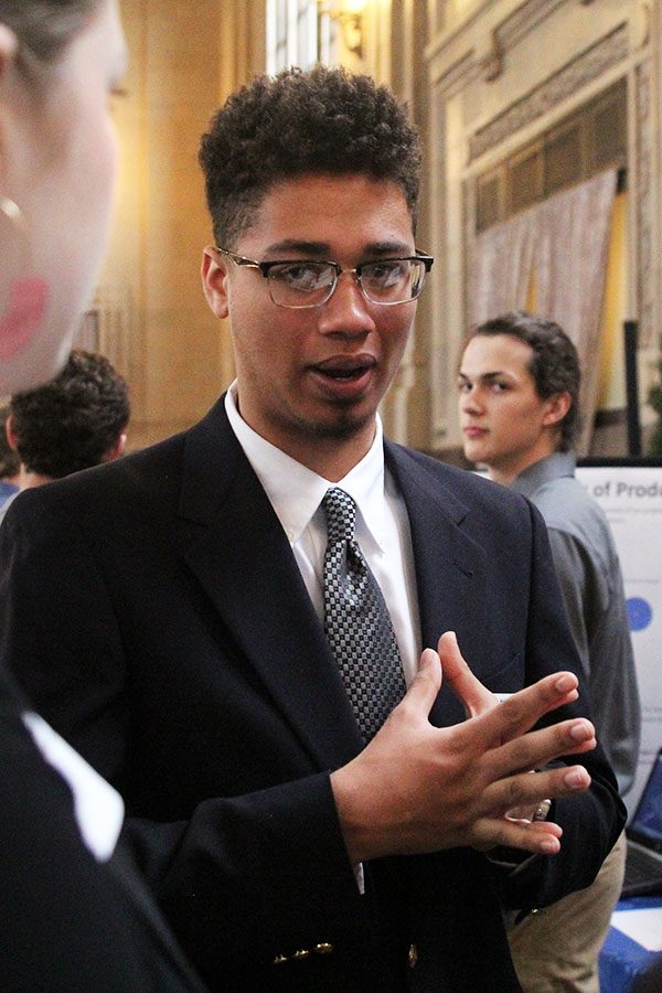 Explaining his senior project, senior Seth Hobson describes the possibilities for traffic relief in Western Shawnee.