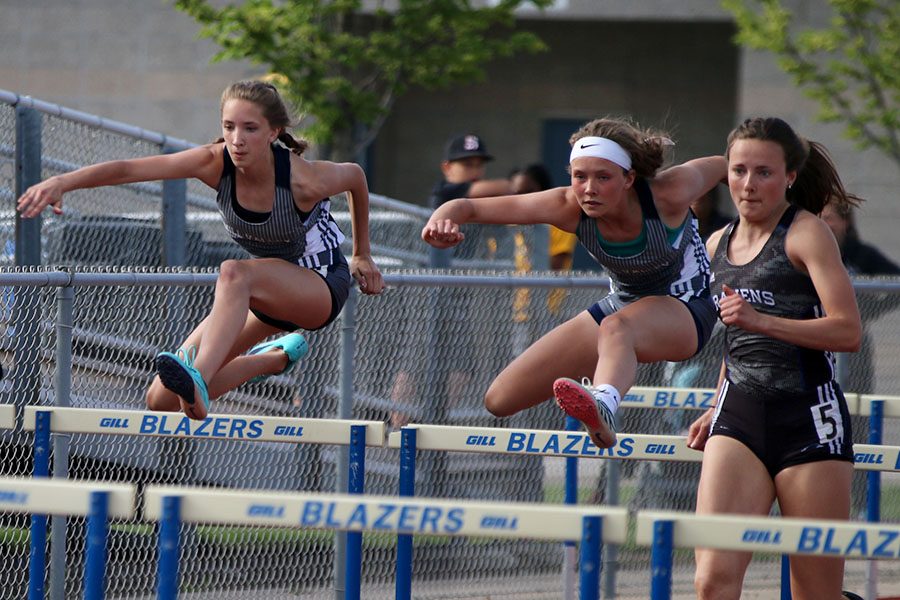 Competing during the 110 meter hurdles, freshmen Emree Zars and Reece Johnston race alongside each other. Johnston finished the event in seventh with Zars finishing in eighth. 