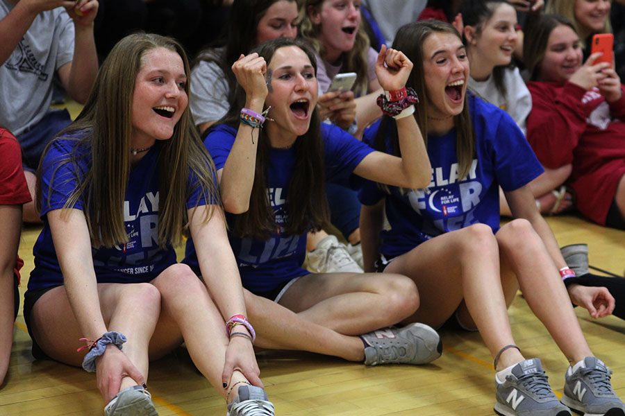 Watching a game of jump the creek, junior Morgan Koca cheers on her peers. I think that Relay really boosted the atmosphere of our school because everyone was able to come together for one event and was really excited about raising awareness and over one hundred thousand dollars for such a great cause, Koca said. 