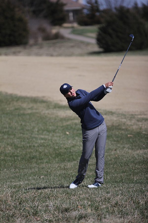 Directing the ball down the fairway, sophomore Nick Mason competes on hole 15 to finish in 9th at the BVNW Lionsgate Invitational.