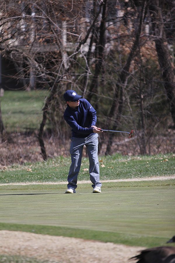 Putting on hole 6, senior Jack Matchette finishes 11th at the Lionsgate on Monday, April 1.