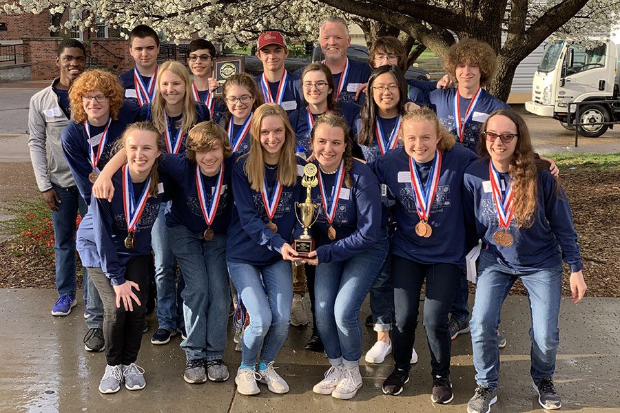 After the award ceremony, the team poses for a picture after their third place victory. The team ended with a total score of 136 points, 22 points behind the second place team. “Our team has become like a family over the season," senior Sydney Clarkin said. "We all work very well together and are very supportive of one another."