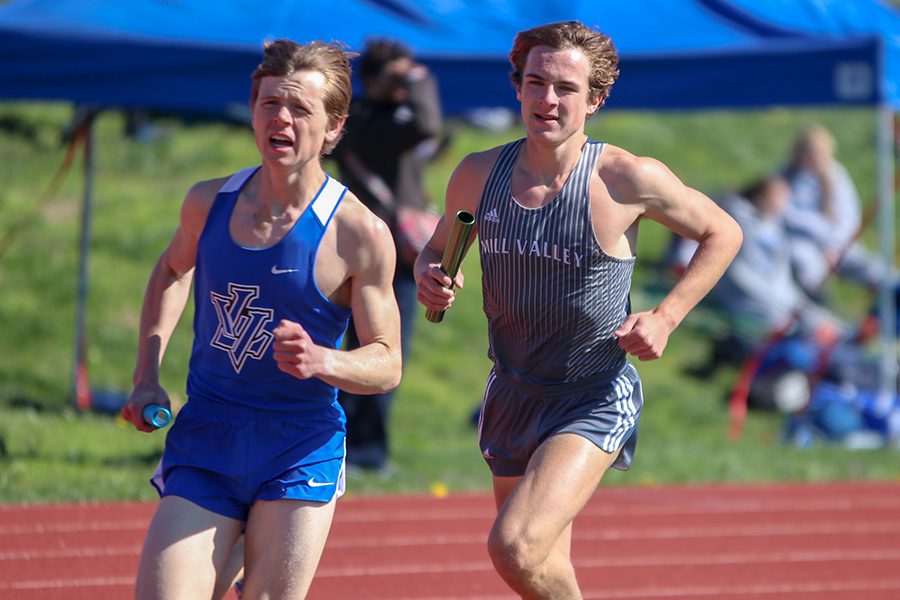 Following a Leavenworth runner, junior Nick Schmidt competes in the first leg of the 4-by-800-meter relay.