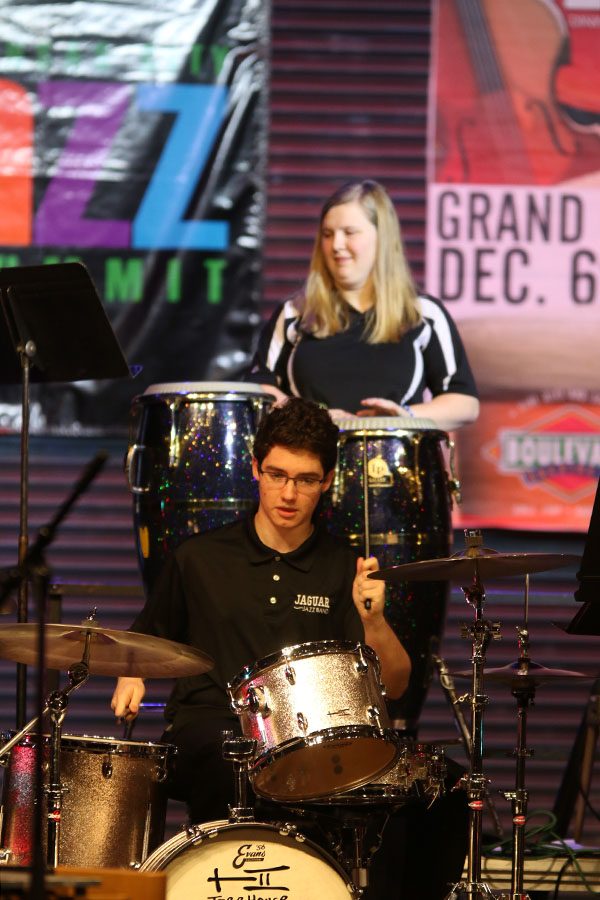 Junior Cael Duffin plays the drums during the jazz performance.