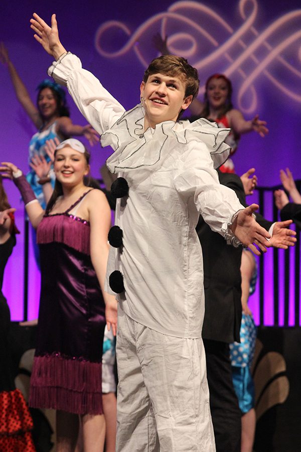 At the end of the show, senior Noah Smith poses during curtain call.