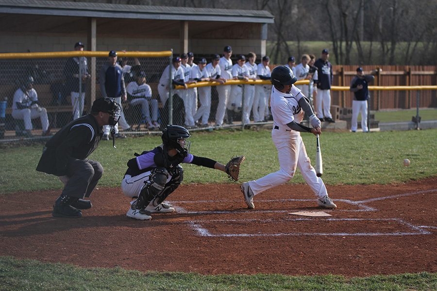 Swinging the bat, senior Johnathan Contreras attempts to make contact.