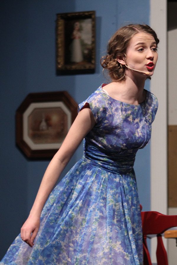Speaking to her family, Alice, played by senior Annika Lehan, talks about Mr. Kirby