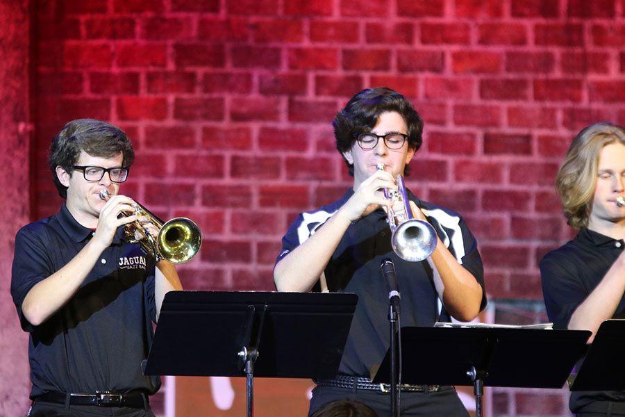 Senior Michael Cowen and junior Jason Kingsbury play trumpet on Wednesday, April 25.