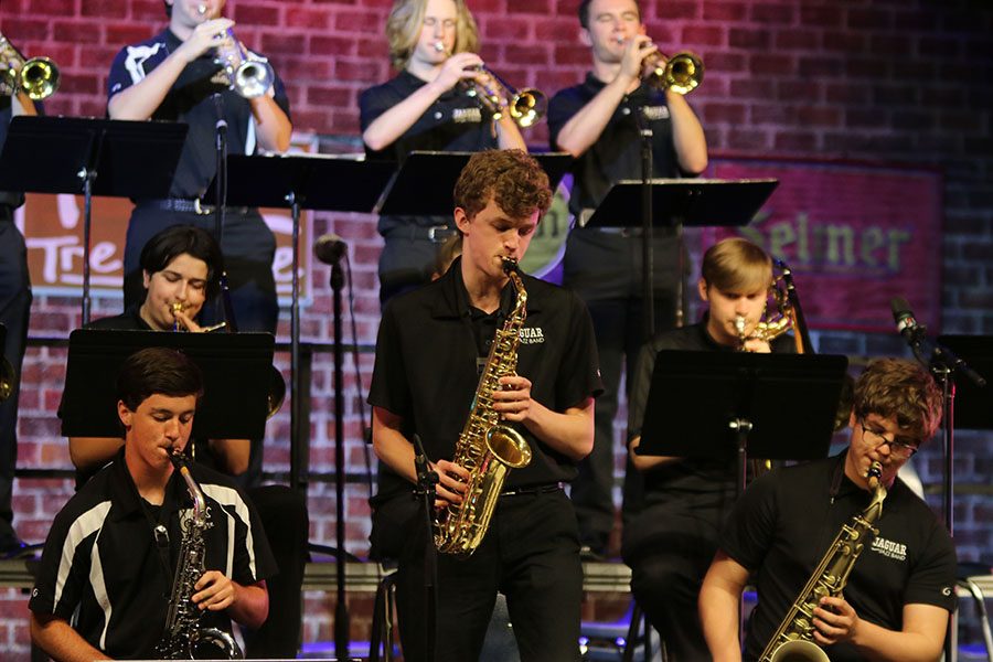 During the Mill Valley high school Jazz performance on Wednesday April 25, Sophomore John Fraka stands up to play his solo piece. The band competed at Kansas City Community College and was one of only three bands to receive the Outsdanding Jazz Ensemble award out of the 22 schools at the festival.