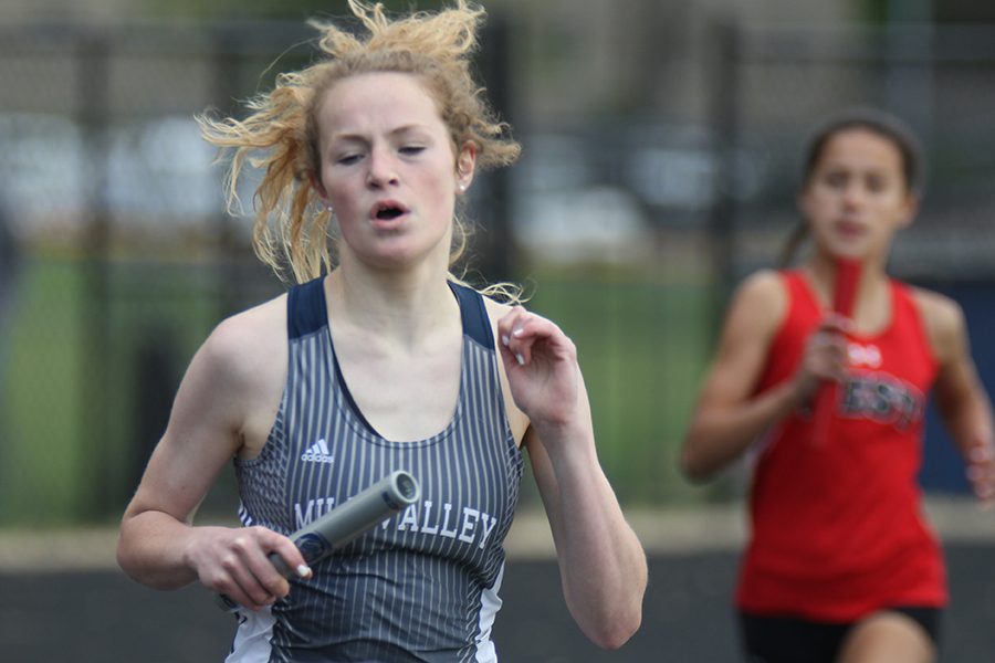 Beginning her second lap, sophomore Molly Ricker competes in her relay.