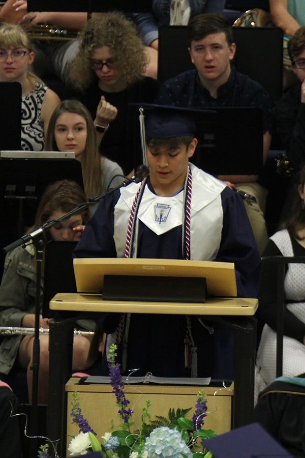 Senior class president Eli Midyett presents his speech in front of the senior class. 