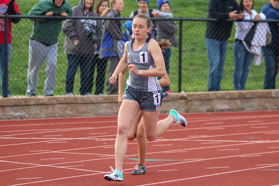 After the starting the gun, senior Delaney Kemp begins the 1600 meter run. Kemp finished first and broke the school record with a time of 5:07.