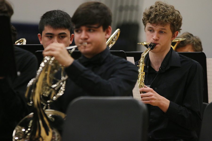 Eyes focused on the music, sophomore John Fraka performs “Swashbuckler” composed by John Roberts.