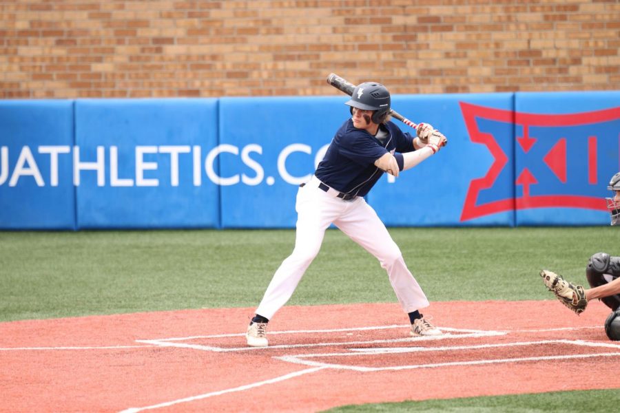 Getting ready to swing, senior Cole Moore stares at the pitcher, Thursday, May 23.