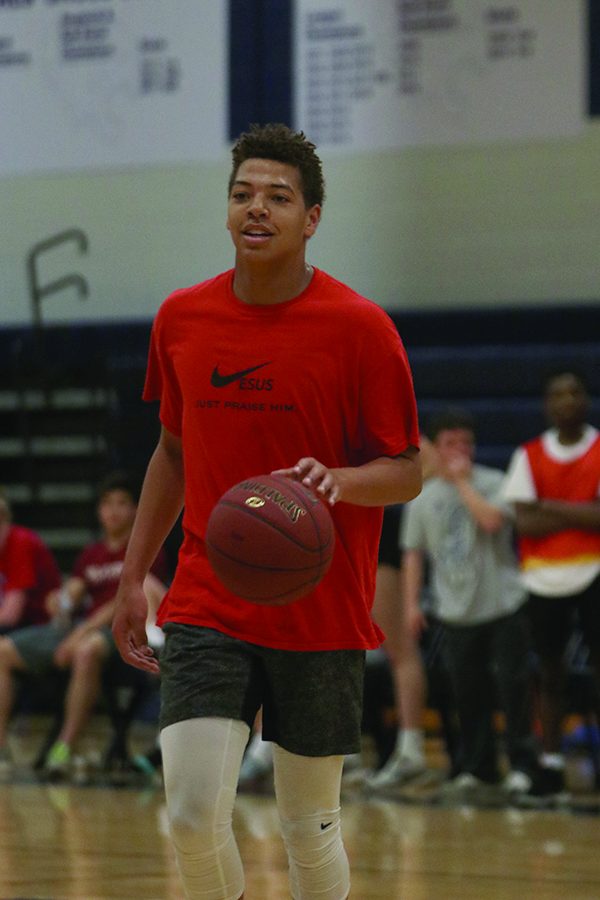 Senior Matthew Wittenauer dribbles the ball.