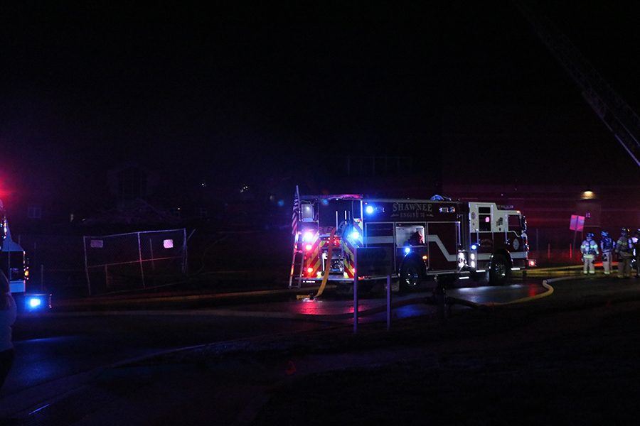 After arriving at Mill Valley High School, Shawnee fire engine pumps water from the fire hydrant to the school. 