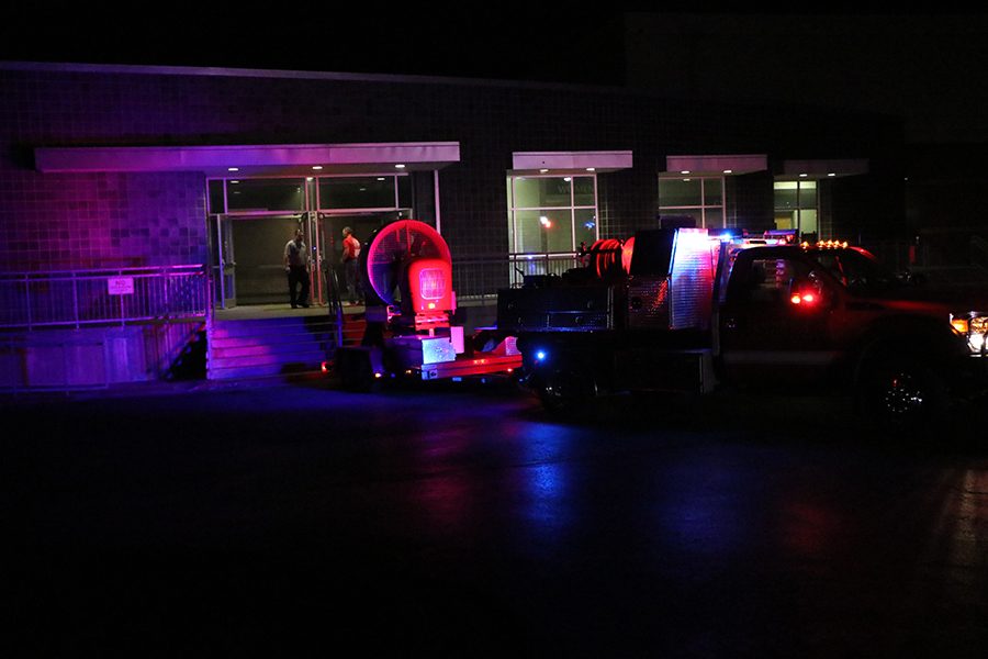 After the fire is out the Lenexa Fire Department uses a fan to blow out  smoke from the buildings interior. 