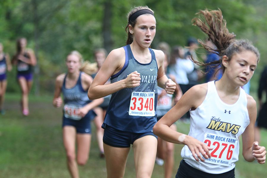 Beginning the third mile of the race, senior Morgan Koca pushes to secure her eighth place finish, with a time of 19:07.