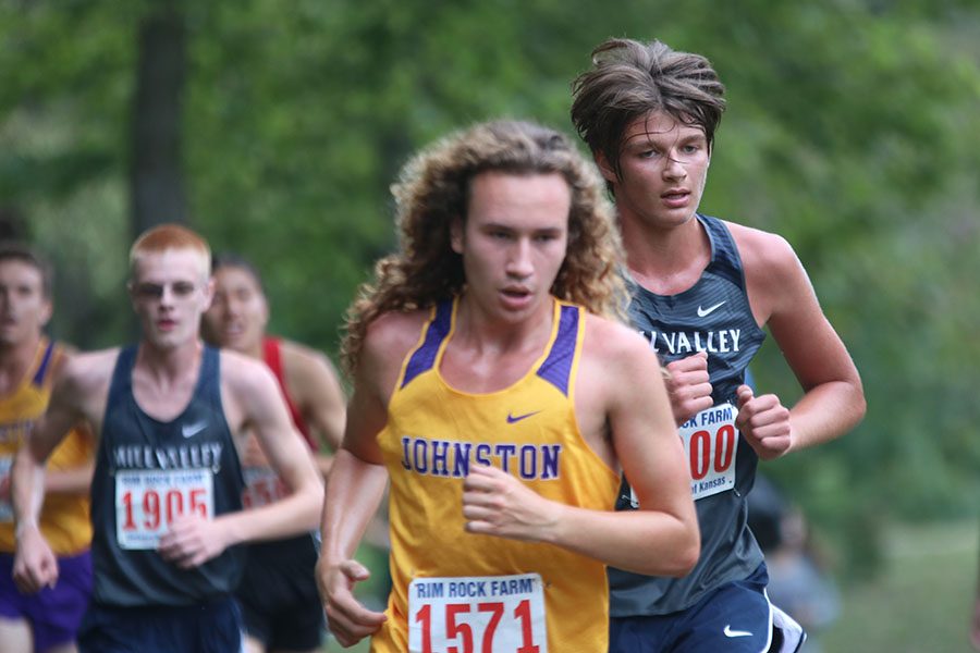 Senior Nathan Greenfield eyes his competitor as he nears the end of the race.