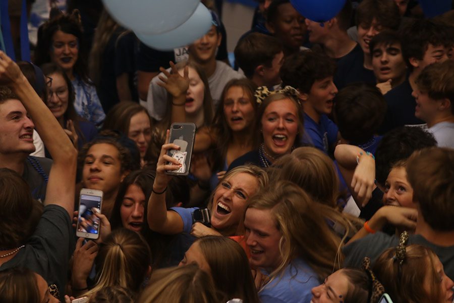 Senior Annie Hoog takes a selfie in the middle of the Blue Bomb chaos. 