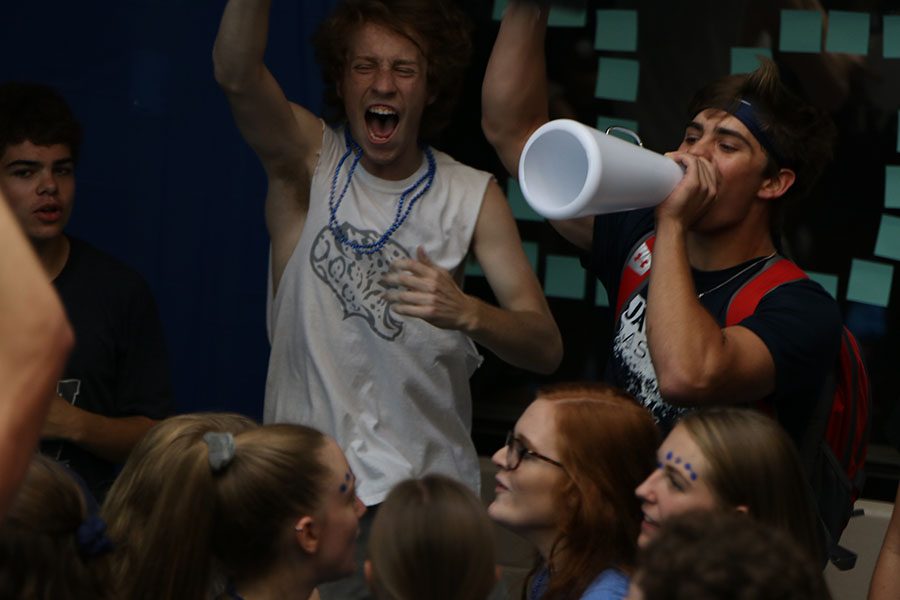 Senior Cline Boone leads the seniors in a school chant. 
