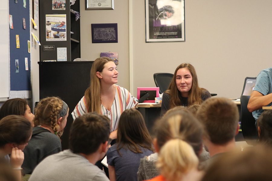 Explaining the Womens Empowerment Club’s purpose, juniors Avery Kuehl and Grace McLeod address future club members at their first meeting on Thursday, Sept. 5.