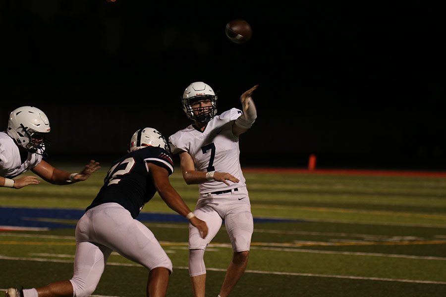 Junior quarterback Cooper Marsh fires the ball downfield during the team's 27-7 win over St. James Friday, Sept. 13. 