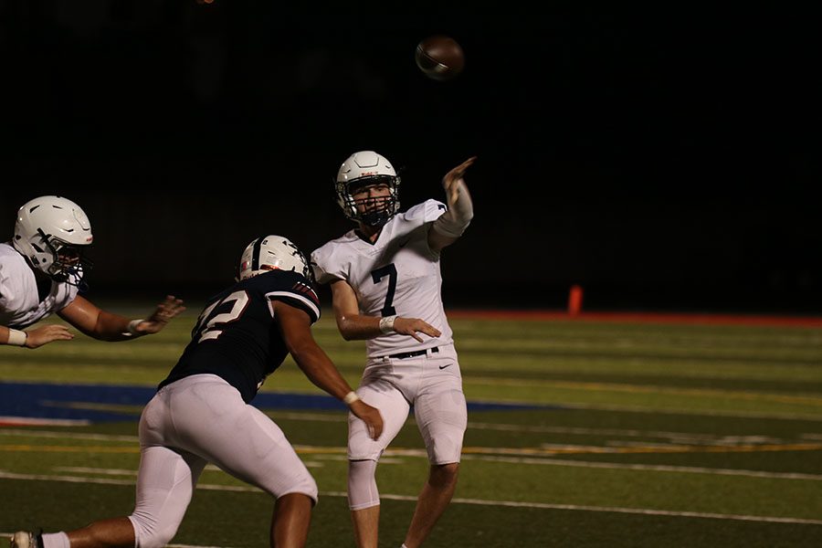 Junior quarterback Cooper Marsh fires the ball downfield during the teams 27-7 win over St. James Friday, Sept. 13. 