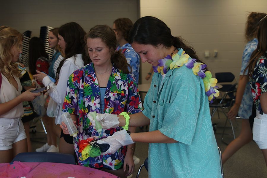 Finishing up their T-shirts and preparing for clean up, sophomores Lauren Walker and Quincy Hubert finish their last touch ups on their T-shirts.