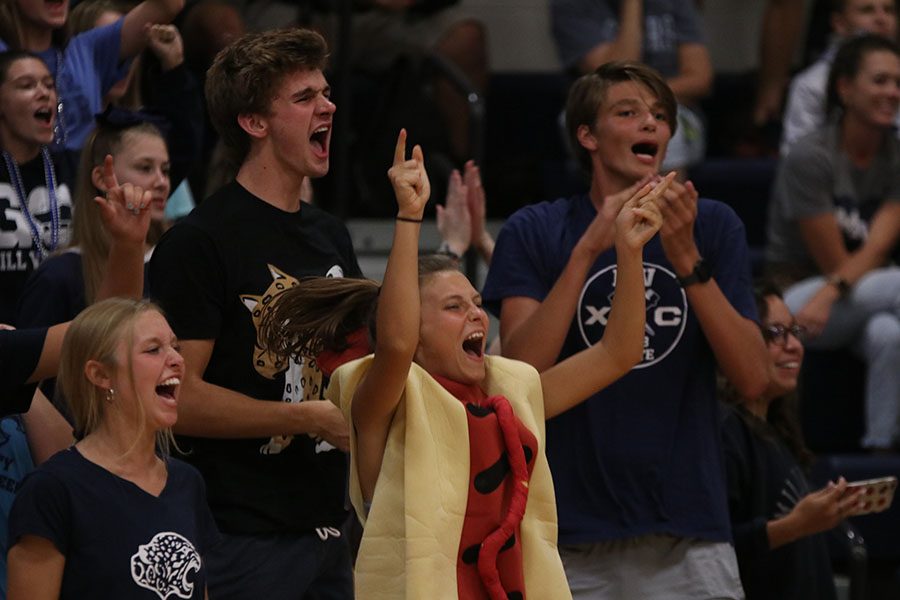 Senior Avery Altman cheers during the musical chairs game.